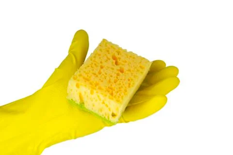 Yellow sponge in hand Stock Photos