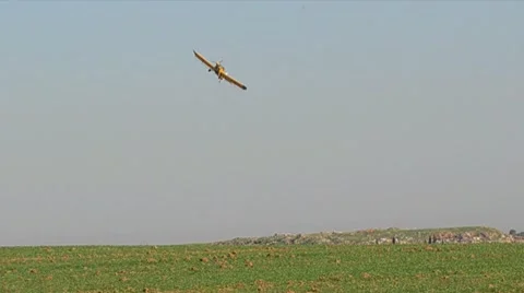 Yellow spray plane 01 Stock Footage