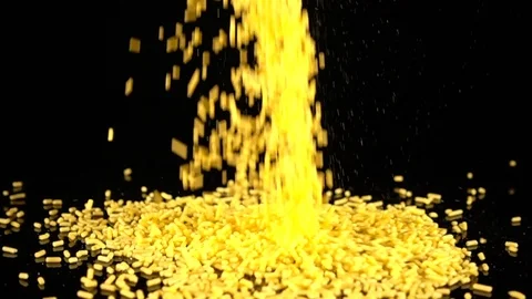 Yellow Sprinkles falling in slow motion. 库存影片 88615705