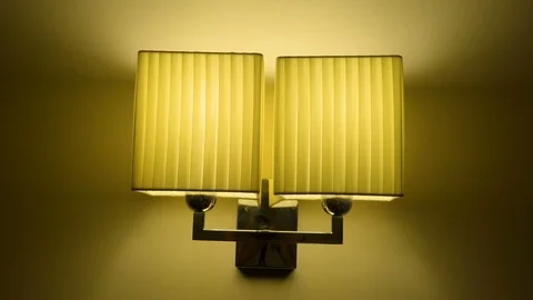 The yellow square lampshade on the wall Stock Footage 85467697