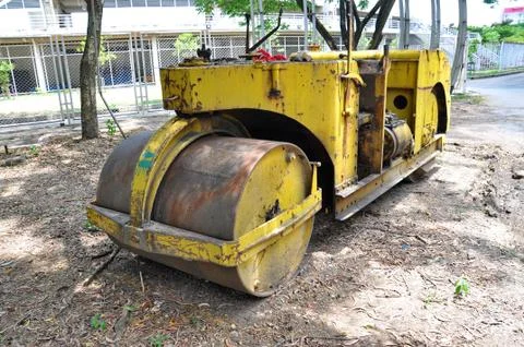 Yellow steamroller Stock Photos