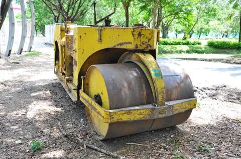 Yellow steamroller Stock Photos