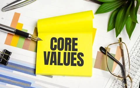 Yellow sticker with the text core values and charts 写真素材