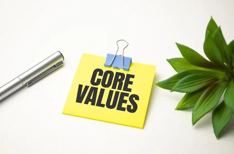 Yellow sticker with the text core values and charts Stock Photos