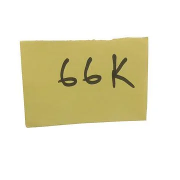 Yellow sticky note with 66k text written in black marker Stock Photos