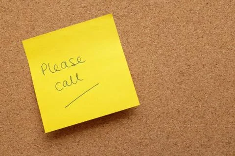 Yellow sticky note - Please Call - on cork board Stock Photos