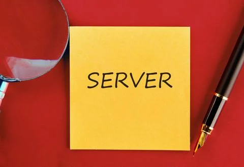 A yellow sticky note with the word SERVER prominently displayed lies on a vib Stock Photos