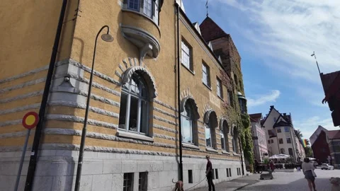 Yellow Stone Building with Arched Windows in Visby, Sweden Stock Footage 347671795
