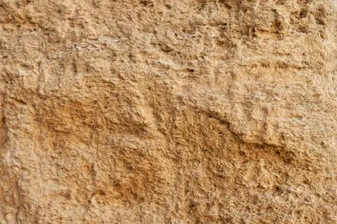 Yellow stone texture, close up. Stock Photos