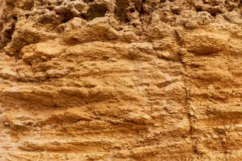 Yellow stone texture, close up. Stock Photos