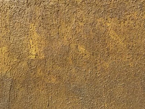 Yellow stone wall texture Stock Photos