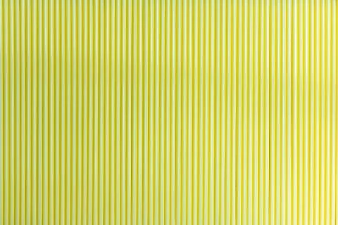Yellow straws abstract pattern background. Stock Photos