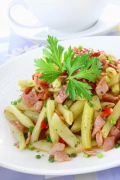 Yellow string beans with ham and paprika Stock Photos