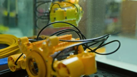 Yellow Submersible Robot Floating in Water Tank for Engineering Test Stock Footage 343516155