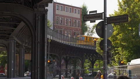 Yellow subway train going on the bridge in Berlin, Germany, October 2019 Stock Footage 119075905