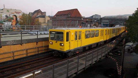 The yellow subway train passes through the viaduct. Stock-Footage 107611545