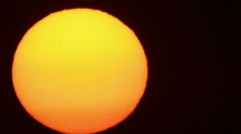 Yellow sun disk on black background Stock Footage 8559004