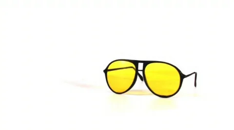 Yellow sun glasses rotating in a loop, HD 720 스톡 동영상 363077