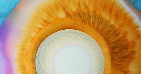 Yellow Sun reaction with liquid ink / oil bloom / Big Bang supernova Stock Footage 113989377