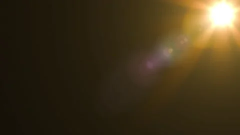 Yellow sun star rays lights optical lens... | Stock Video | Pond5