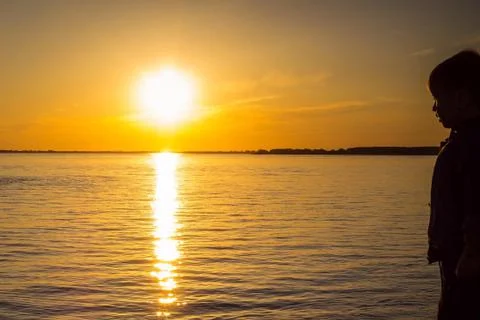 Yellow sun, sunset. Stock Photos