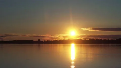 Yellow sunrise on the river Stock Footage 130863735