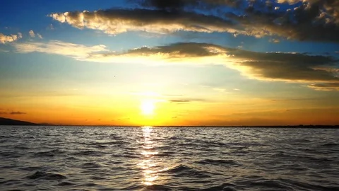 Yellow Sunset in The Middle of The Sea Stock Footage 128780461