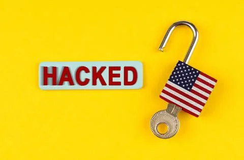 On the yellow surface is an open lock with a key and a sticker with the ins.. Stock Photos