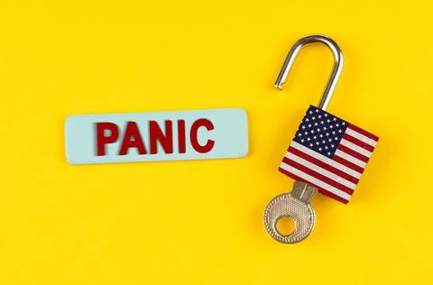 On the yellow surface is an open lock with a key and a sticker with the ins.. Foto stock