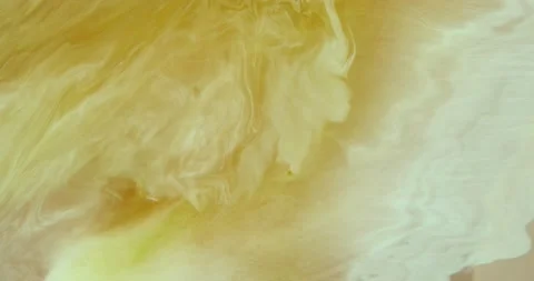 Yellow Swirling Liquid Stock Footage 228745449