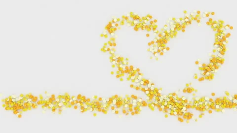 Yellow tablets fall and form a heart shape Video stock 102088779