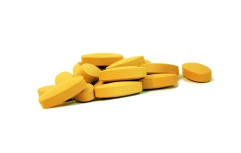 Yellow tablets Stock Photos