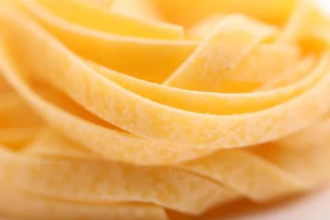 Yellow tagliatelle Stock Photos