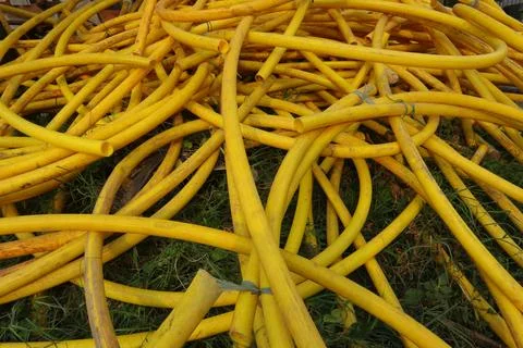Yellow Tangled Cable Hose Stock Photos