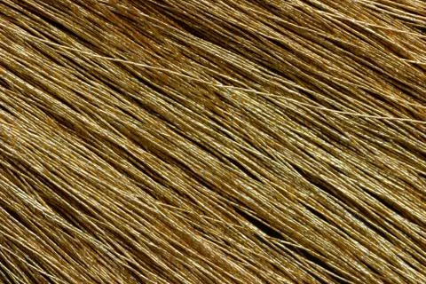 Yellow tassel on table. Stock Photos