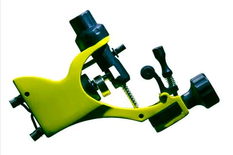 Yellow tattoo machine Stockfoto's