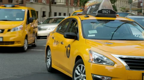 Yellow Taxi Cab Turning in Manhattan New York City NYC USA - Taxicab Driving Stock Footage