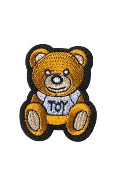 Yellow Teddy bear embroidered patch isolated on white background Foto stock