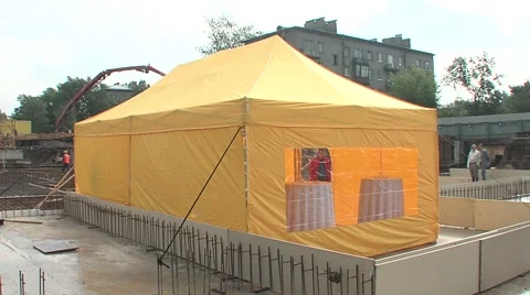 Yellow tent bar tables Stock Footage 5165055