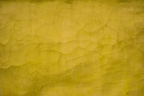 Yellow texture old wall with cracks Stock Photos