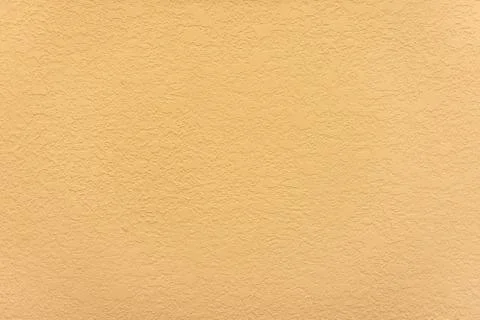 Yellow textured wall Stock Photos