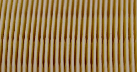 Yellow thin car filter for air filtration, new clean car filter to ensure engine Stock Footage 264161447