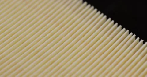 Yellow thin car filter for air filtration, new clean car filter to ensure engine Stock Footage 272582706