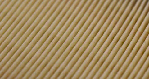 Yellow thin car filter for air filtration, new clean car filter to ensure engine Stock Footage 274237570