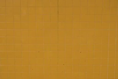 Yellow tile wall facade. Stock Photos