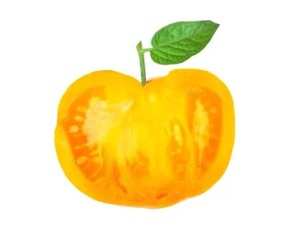 Yellow tomato slice Stock Photos