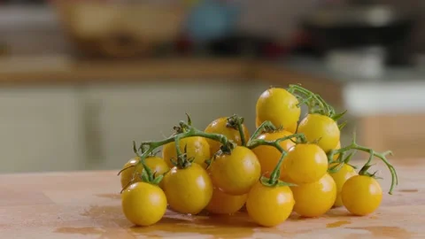 Yellow Tomato On the Table In Kitchen In House Stock-Footage 157994425