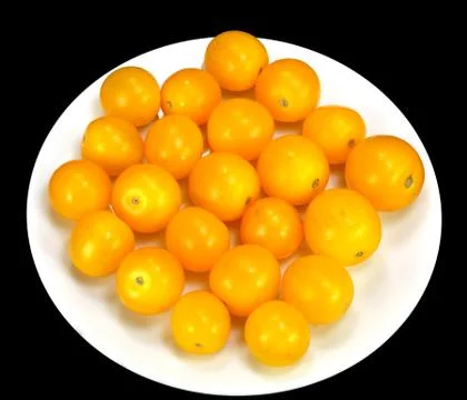 Yellow tomatoes Stock Photos