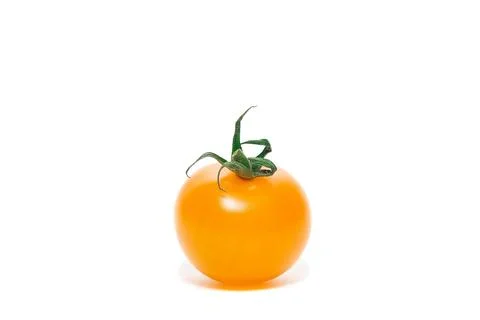 Yellow tomatoes on white background Stock Photos