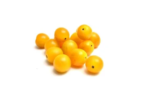 Yellow tomatoes on white Stock Photos